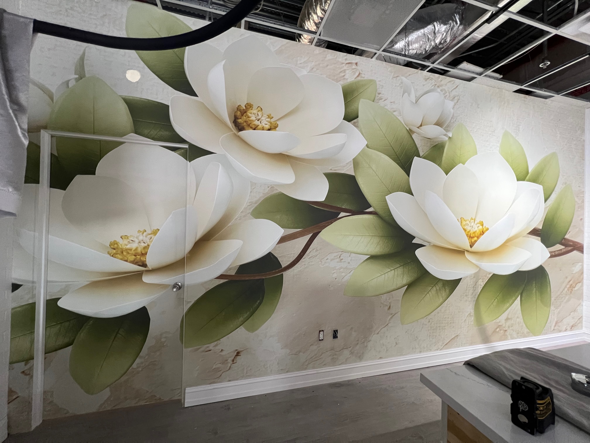 Restaurant installation with flower mural wallpaper